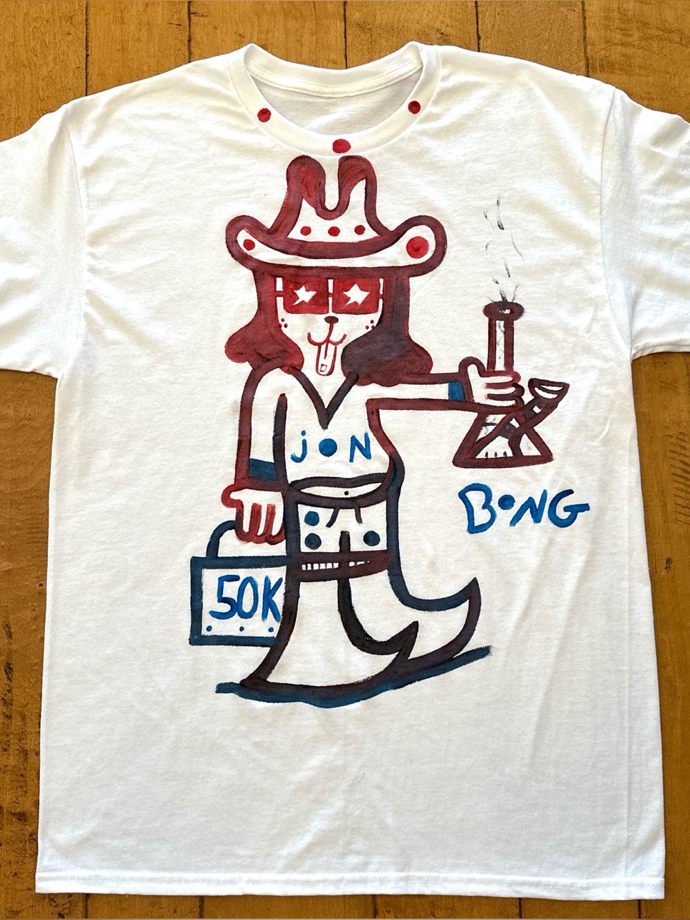 White Graphic Tee with Red and Blue Cartoon Cowboy